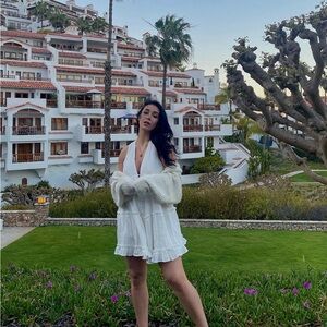 Flown white cotton dress